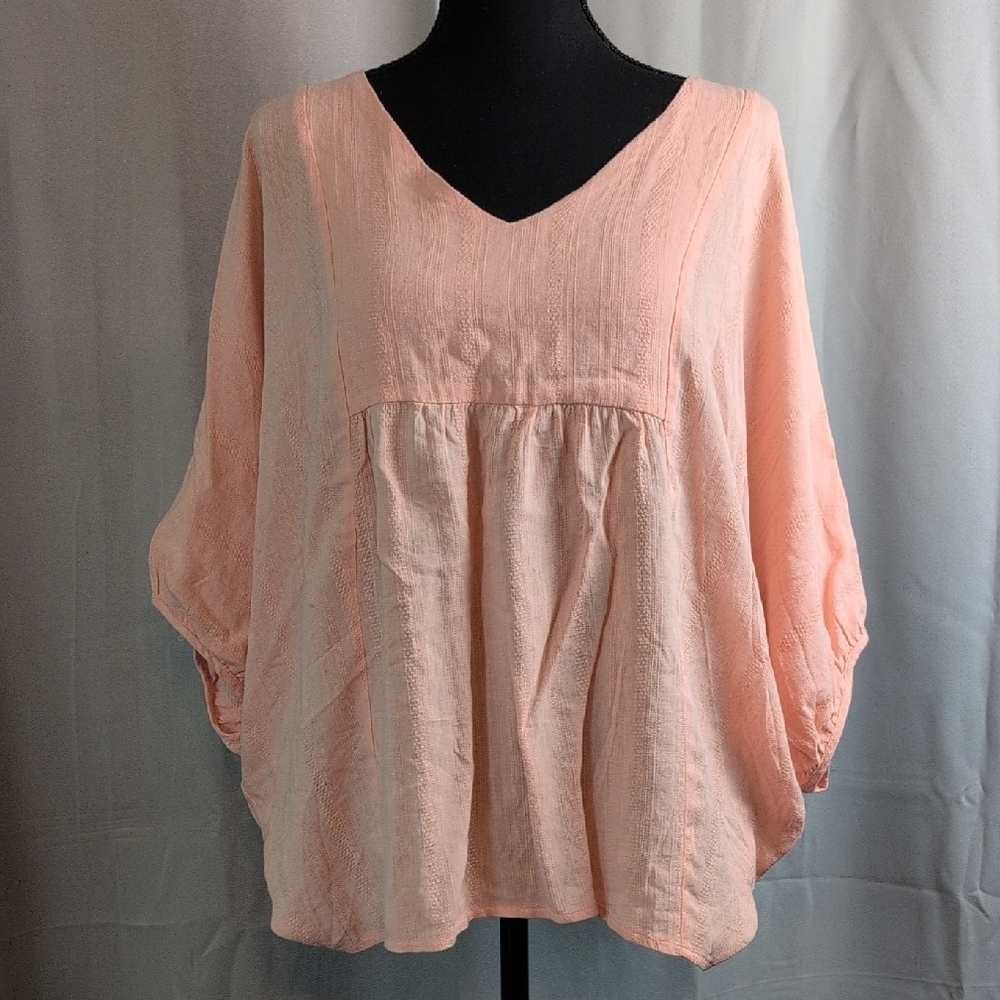 Vibrant Peach Blouse with Elegant Design. NWT